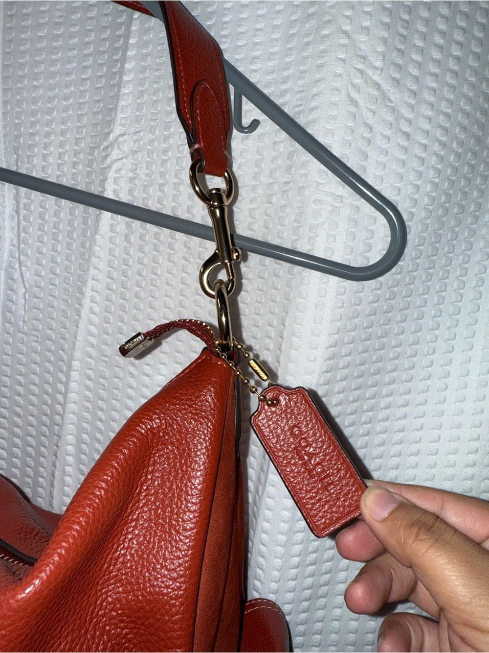 Coach Pennie Shoulder Bag features gold hardware and side suede pockets - Picture 5 of 15